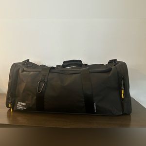 Good Lightly Used Condition - Ted Baker HYKE Black Rubberised Holdall Bag